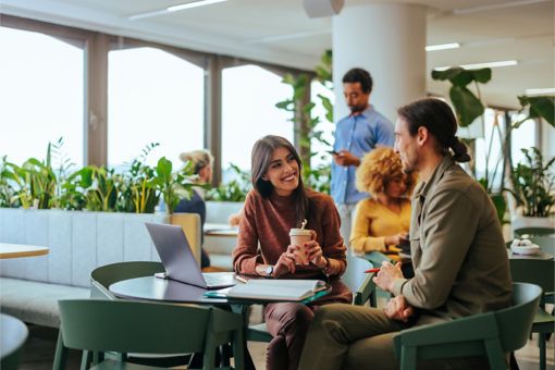 Women at work with co-worker